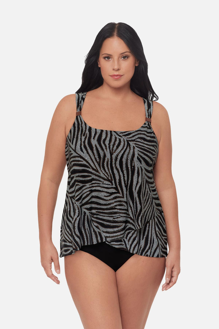 Woman wearing an animal-esque printed tankini top
