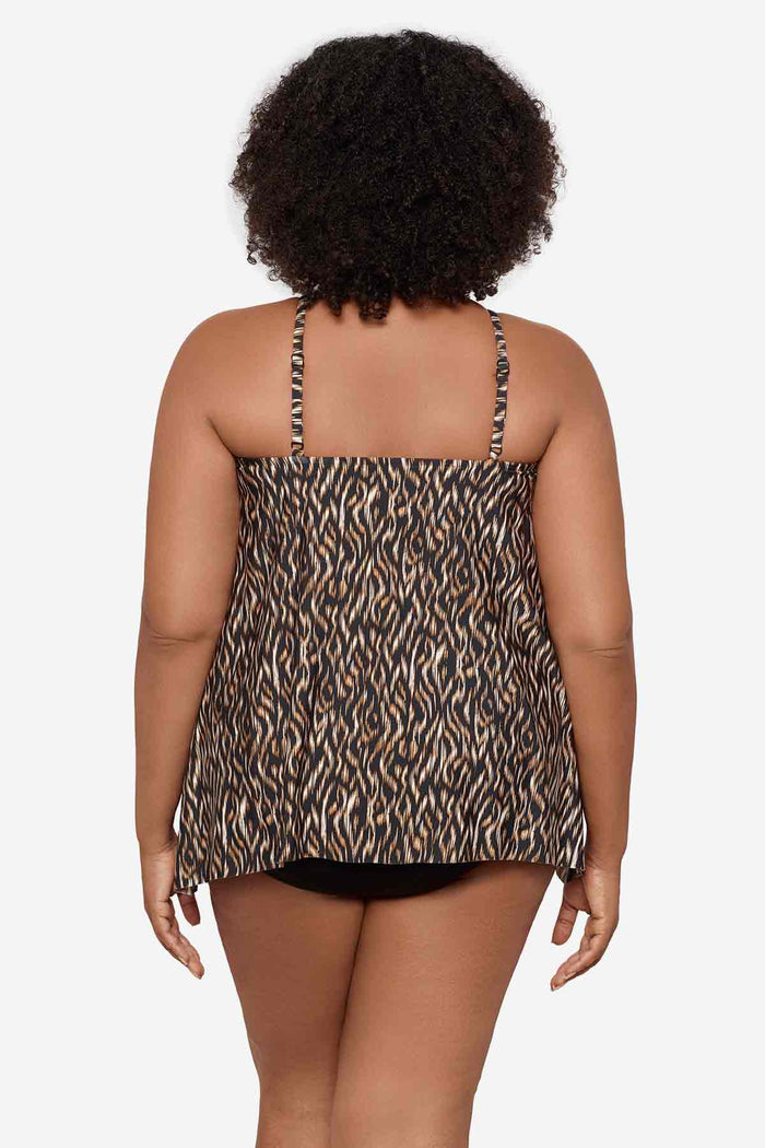 Woman turned away wearing a multicolor tankini top