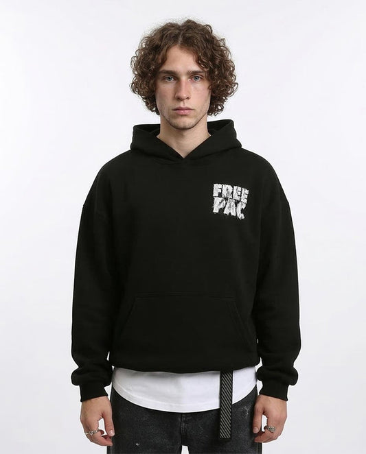 Person wearing a black hoodie with 'FREE PAK' text on a white background