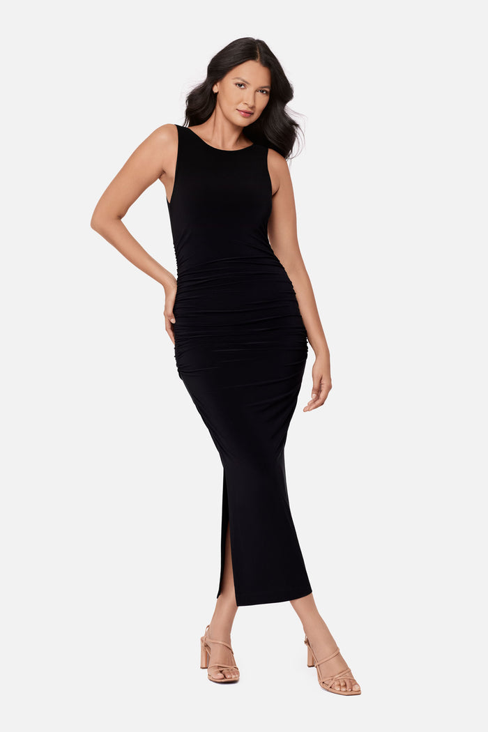 Woman wearing a sleeveless full length black dress