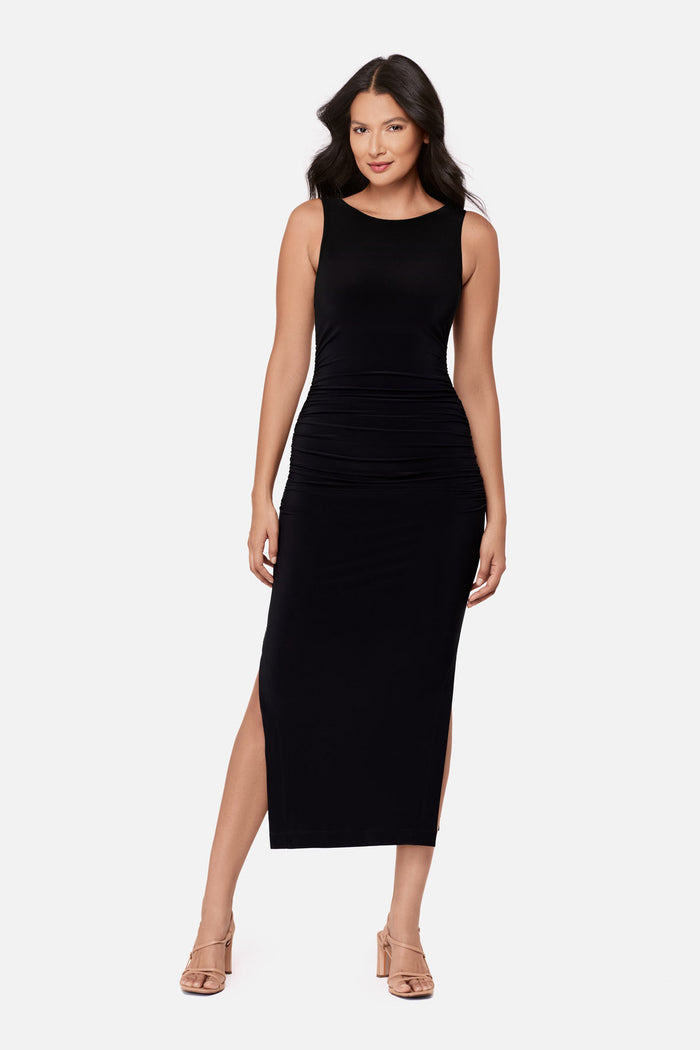 Woman wearing a sleeveless full length black dress