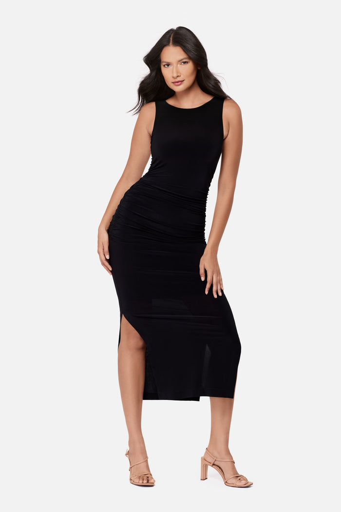 Woman wearing a sleeveless full length black dress