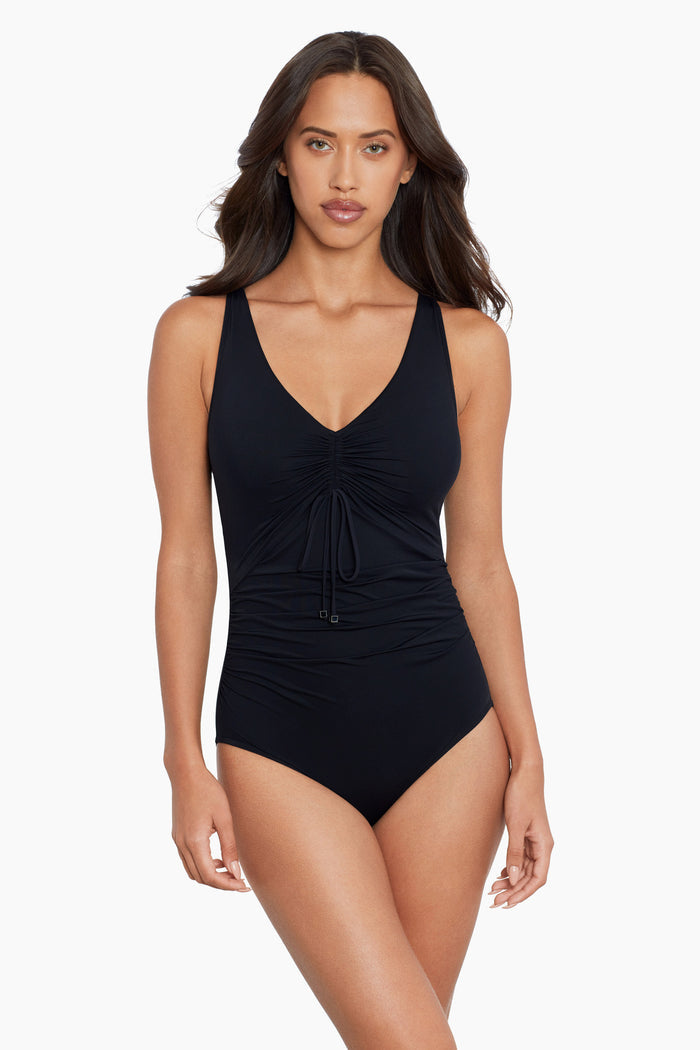 Woman wearing a swimming costume.