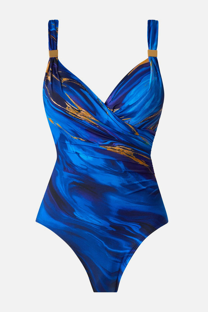 Blue and gold oil slick-esque printed one-piece swimsuit with strap details