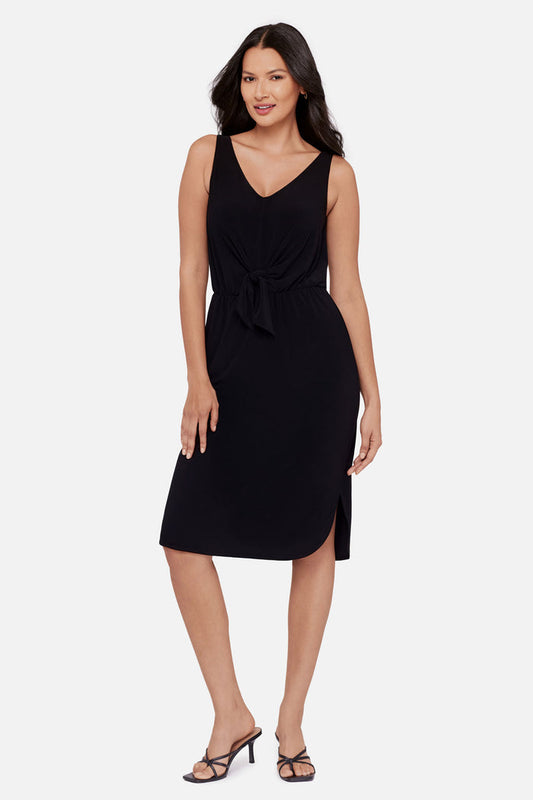 Woman wearing a black sleeveless mid length dress