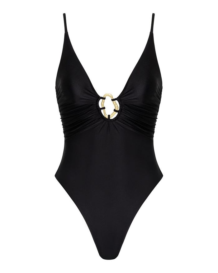 Off-model front view of the LSPACE black Tatum One Piece Swimsuit with a deep V-neckline, gold ring hardware, and ruched waistband.