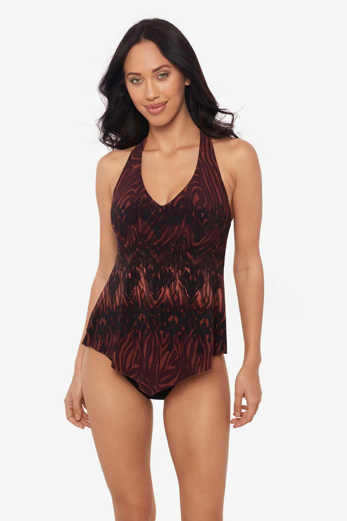 Woman wearing a multicolor tankini top with an abstract animal print