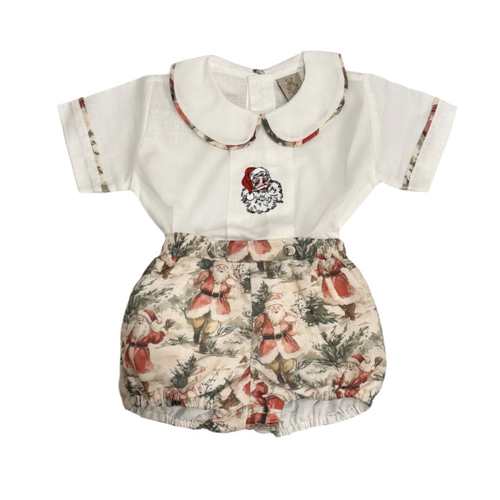 The Santa Claus Boy Christmas 2-Piece Set with ivory embroidered shirt and vintage Santa print shorts