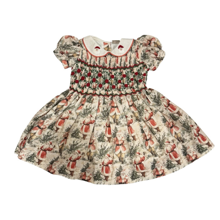 The Santa Claus Christmas Handsmocked Dress in vintage Santa print with embroidered collar details