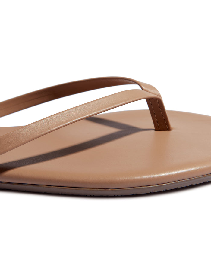 Close-up of the TKEES Foundations Matte Sandals in cocobutter showing the strap and footbed detail.
