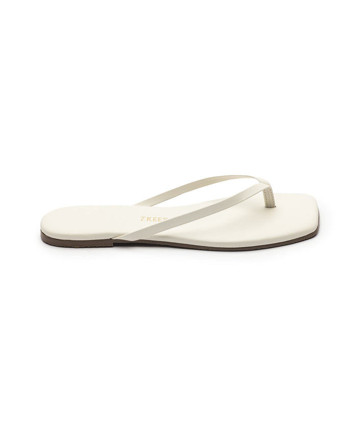 Side view of the TKEES Square Toe Lily Sandals in cream.