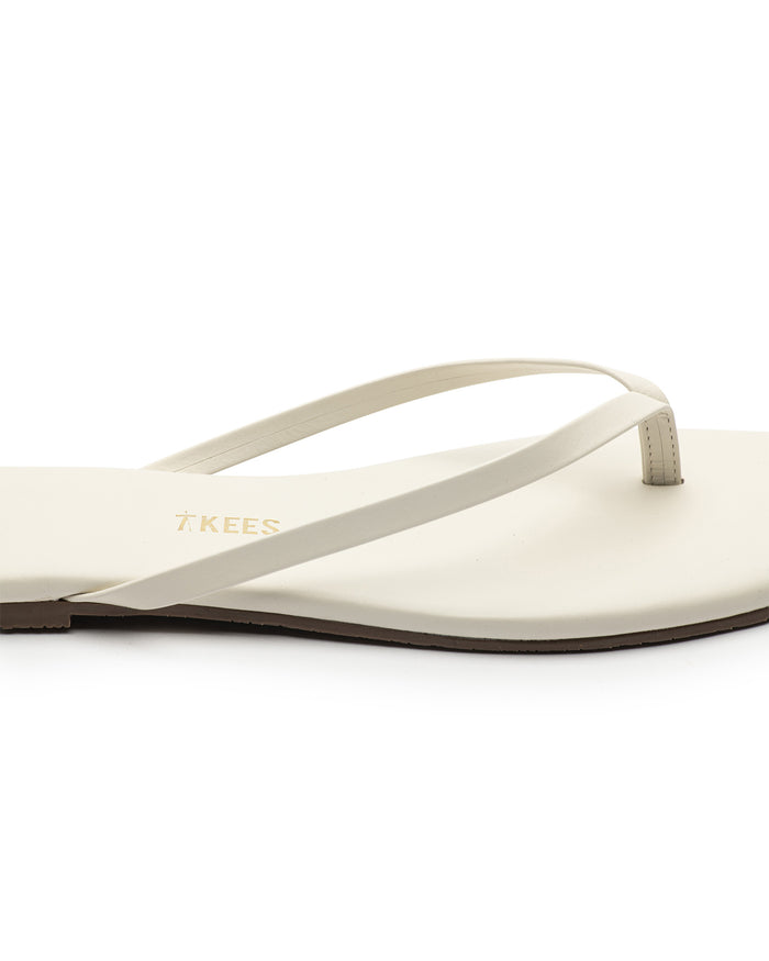 Close-up of the TKEES Square Toe Lily Sandals in cream showing the strap and footbed detail.