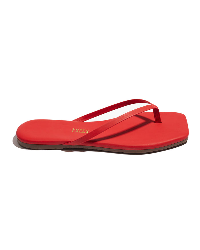 Side view of the TKEES Square Toe Lily Sandals in red.