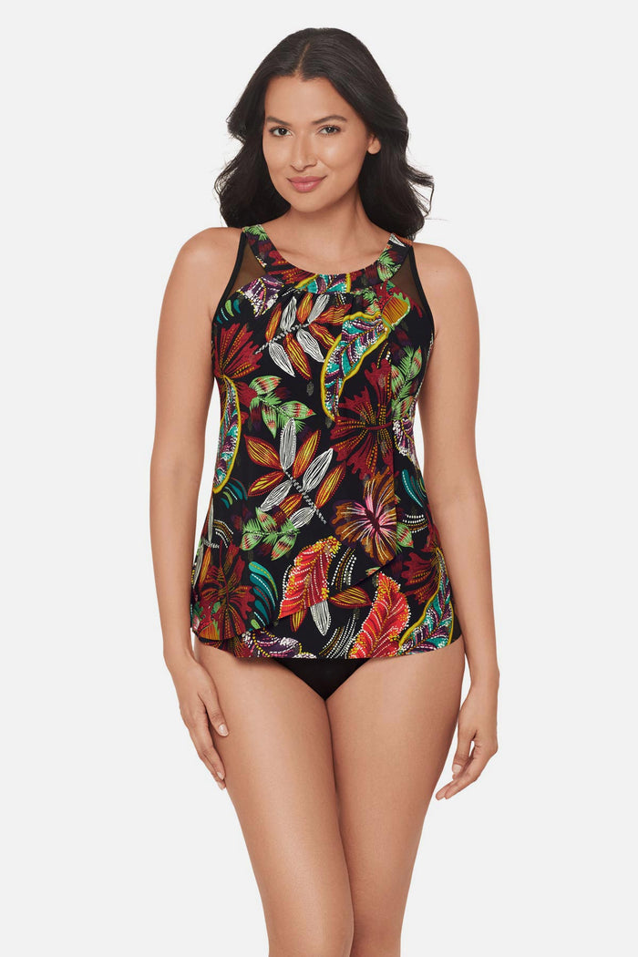 Woman wearing a multicolored floral printed tankini top with mesh details