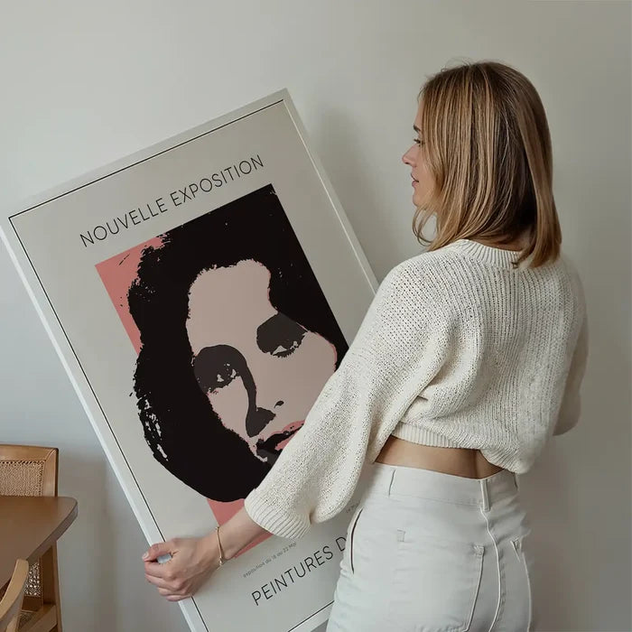 Warhol Nouvelle Exhibition Poster held up against a living room wall