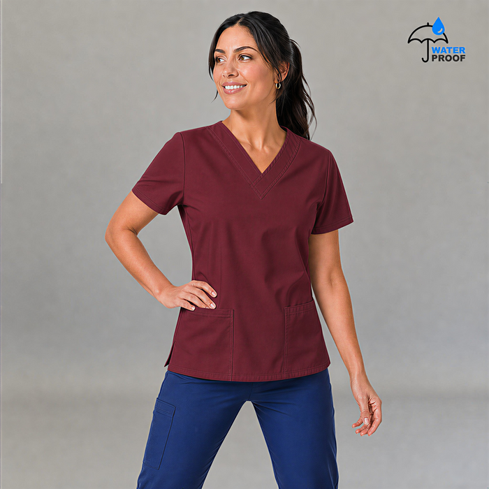 Full body view of women's 502 maroon scrub set walking pose — lightweight fluid-resistant medical uniform S-FOR-ME