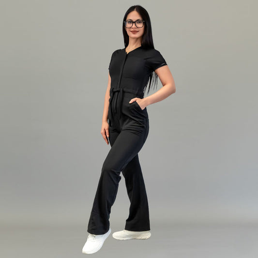 Angled front view of women’s Style 945 Black scrub jumpsuit