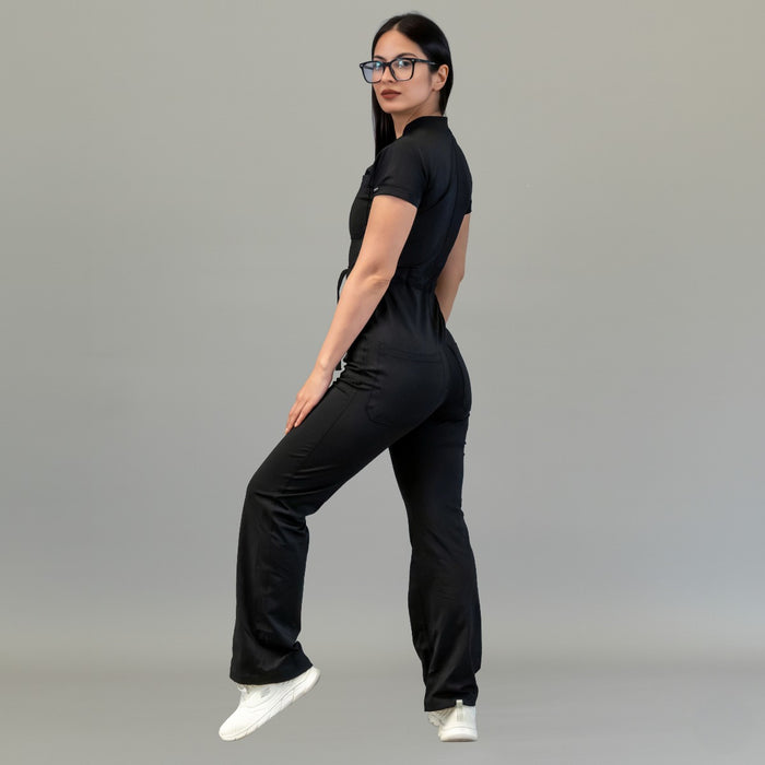 Three-quarter back view of women’s Black Super Stretch scrub jumpsuit