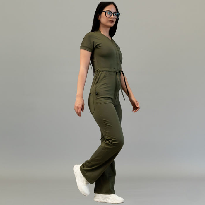Side walking view of women’s Style 945 Olive Green scrub jumpsuit