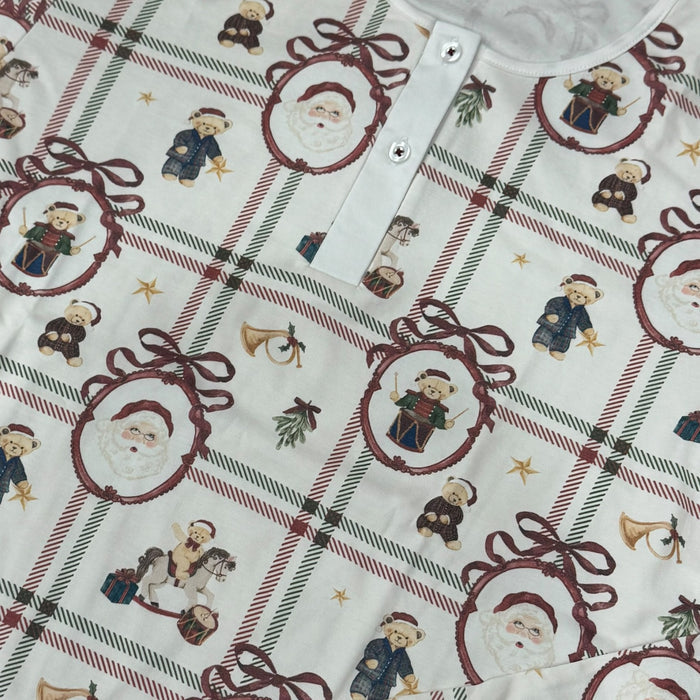 Close-up of Santa, teddy bear and bow motifs on Festive Bears Pima cotton pajamas