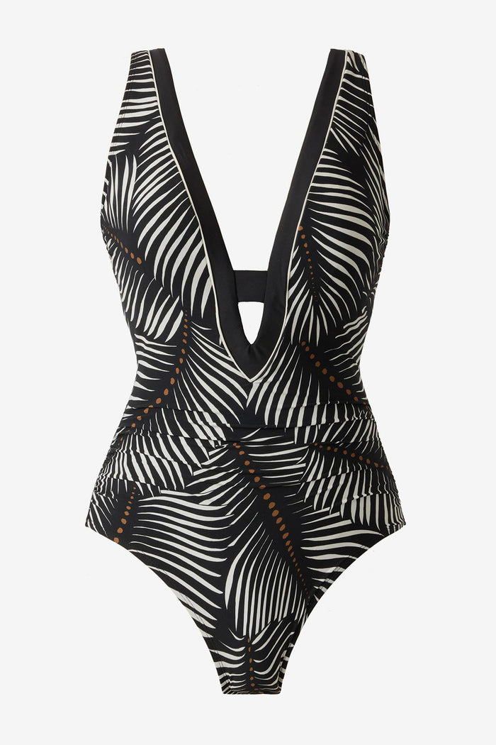 Deep v-neckline one-piece swimsuit with a black and white palm leaf print